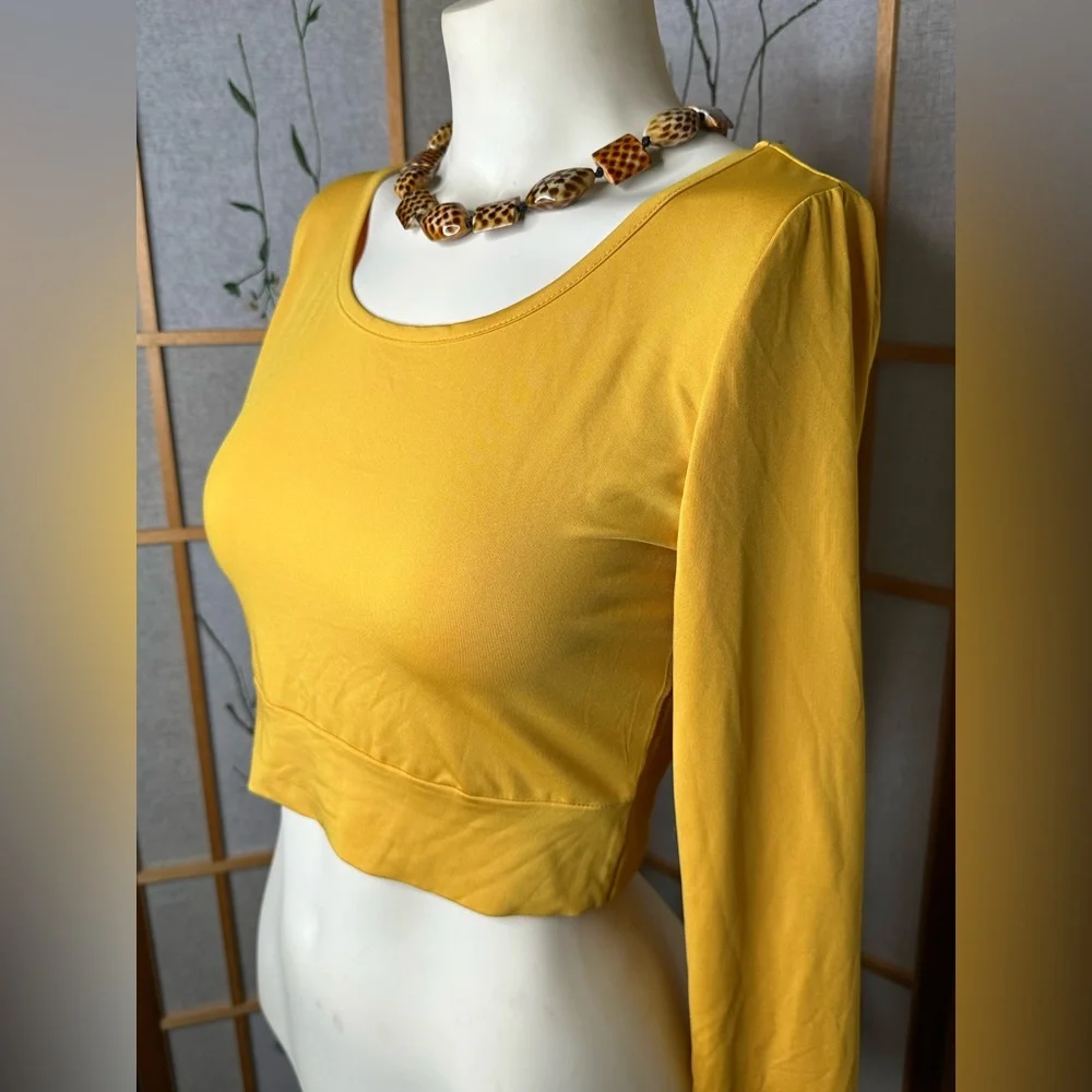 Long sleeve crop top very cute Size large by ENIDMIL color is Gold